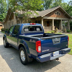 Breezer window with ABS frame on a 2005+ Nissan Frontier pickup truck